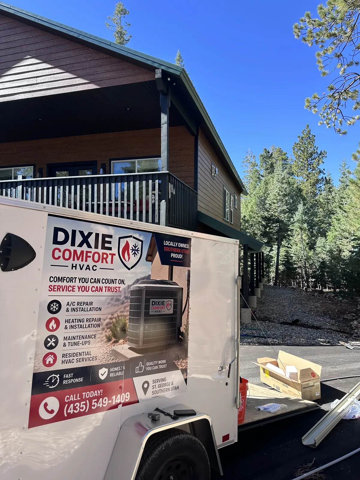 Dixie Comfort HVAC equipment trailer parked at a cabin install in Duck Creek Village, Kane County, Utah